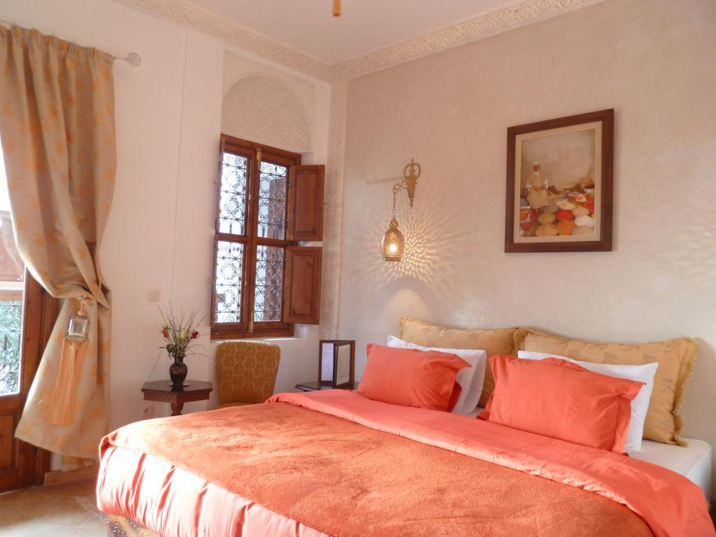 Riad Viva Марракеш Экстерьер фото A bedroom in the hotel
